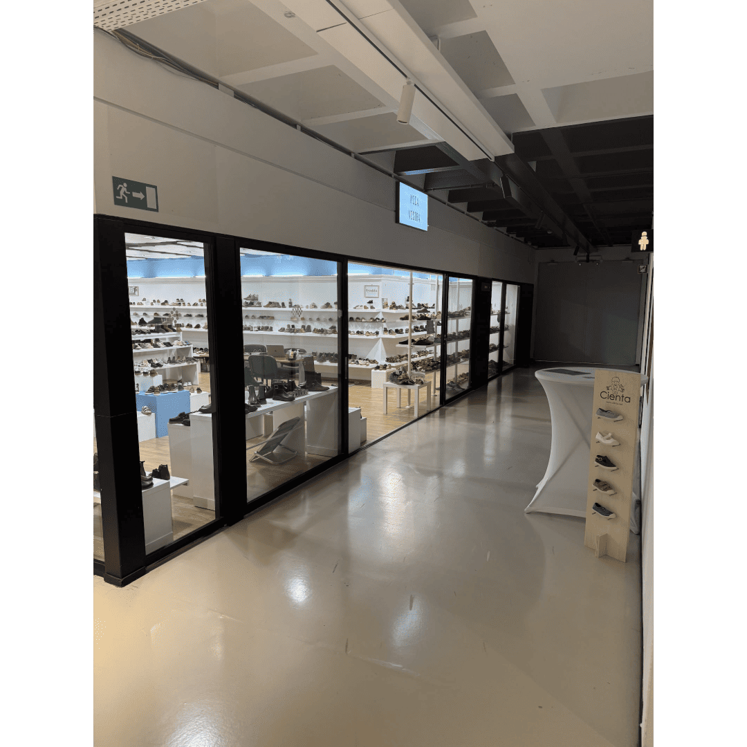 Moda Vostra storefront display at Trademart Brussels - B2B footwear collection