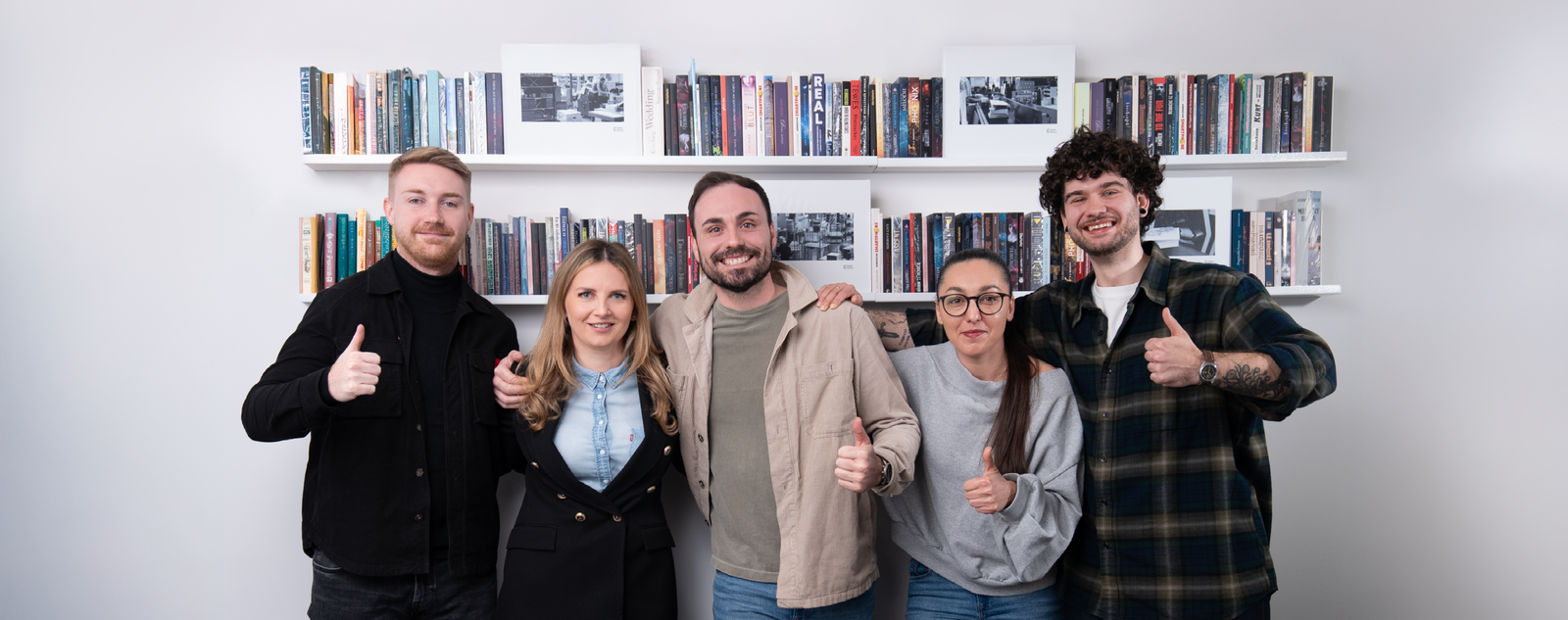 The team of smiling Books Factory employees.